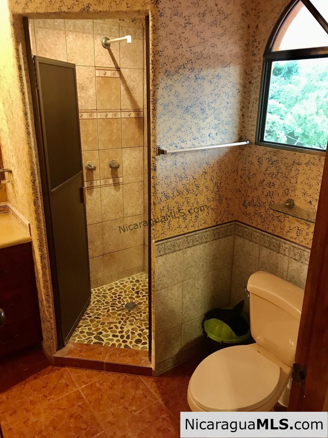 3 bedroom house with rental apartment within walking distance to the beach