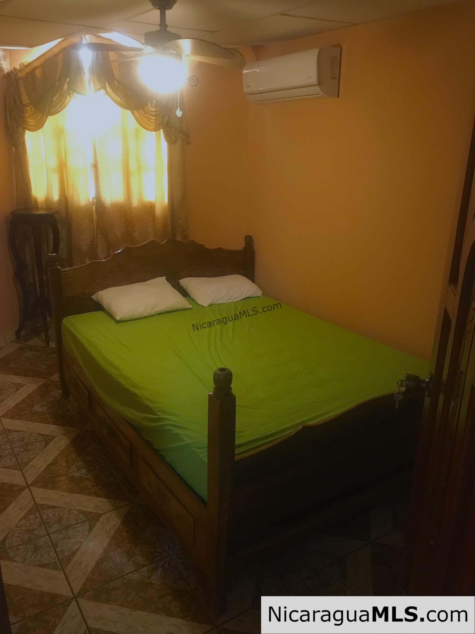 3 bedroom house with rental apartment within walking distance to the beach