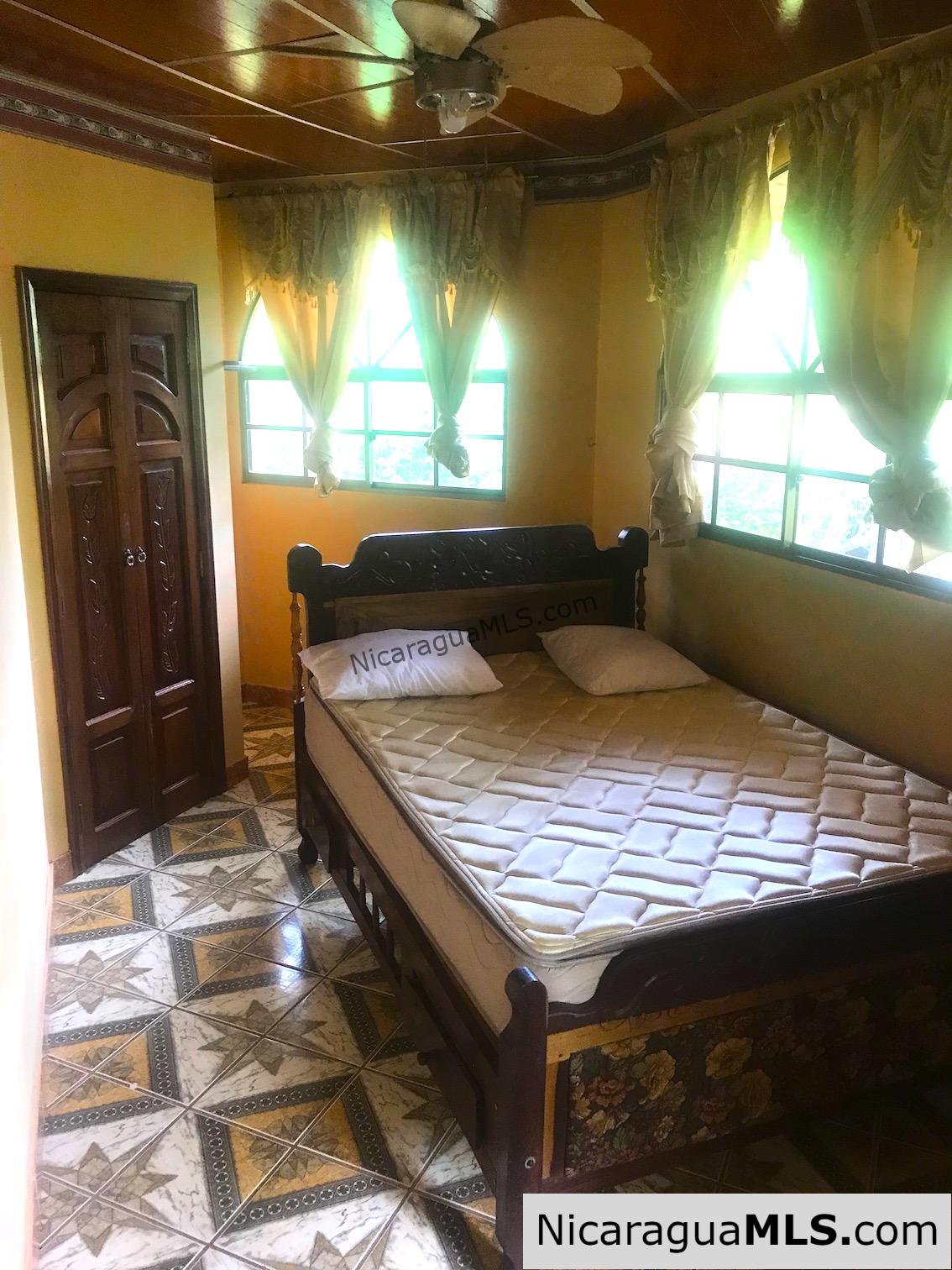 3 bedroom house with rental apartment within walking distance to the beach