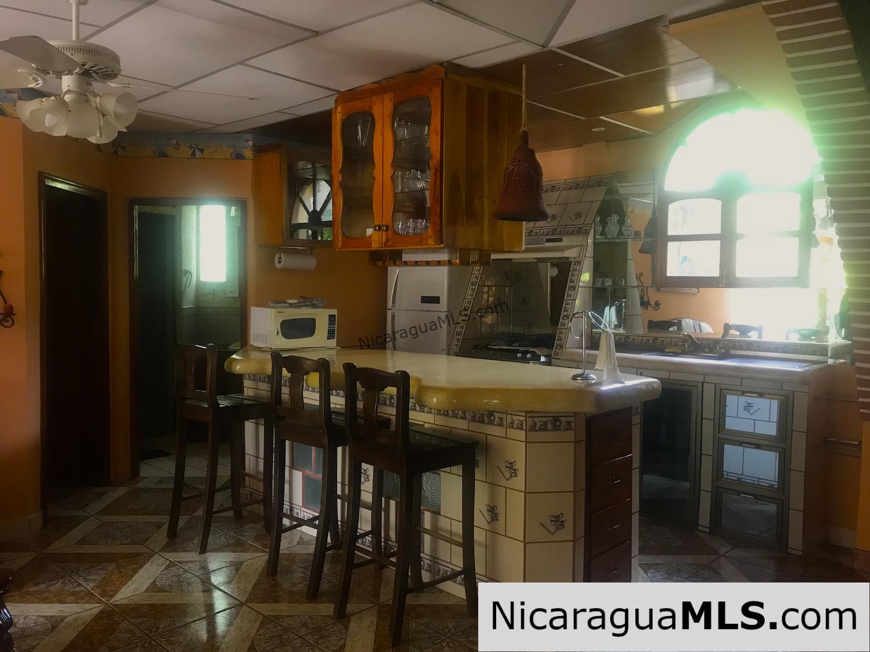 3 bedroom house with rental apartment within walking distance to the beach