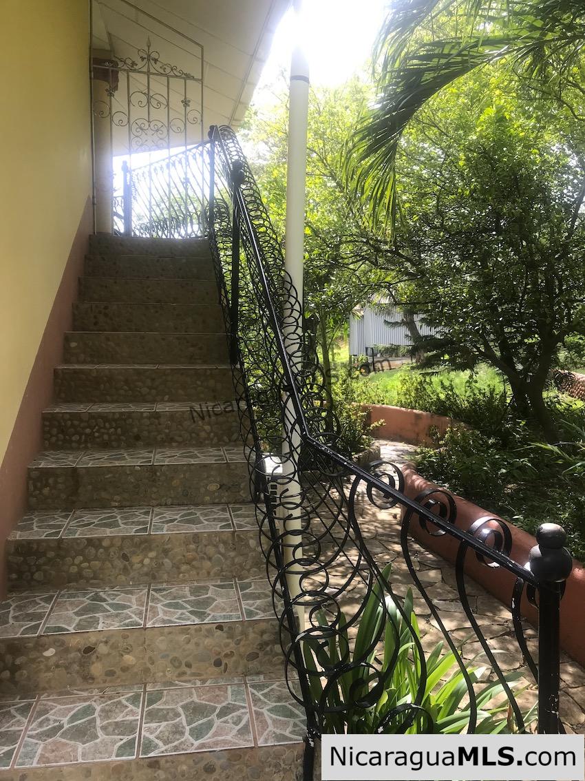 3 bedroom house with rental apartment within walking distance to the beach