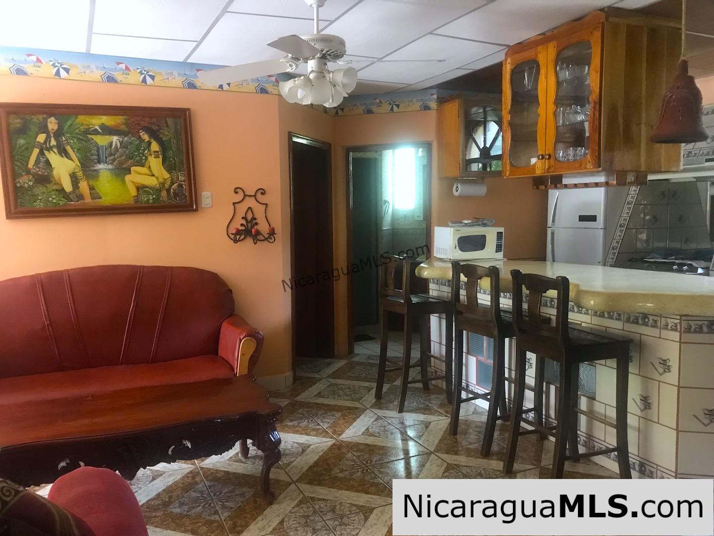 3 bedroom house with rental apartment within walking distance to the beach